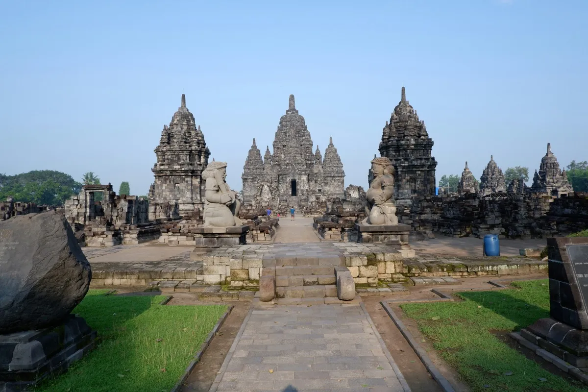 The vertical Hindu spires of Prambanan rise above the Javanese plain — a UNESCO World Heritage compound 40 kilometres east of Borobudur's stepped Buddhist stupa